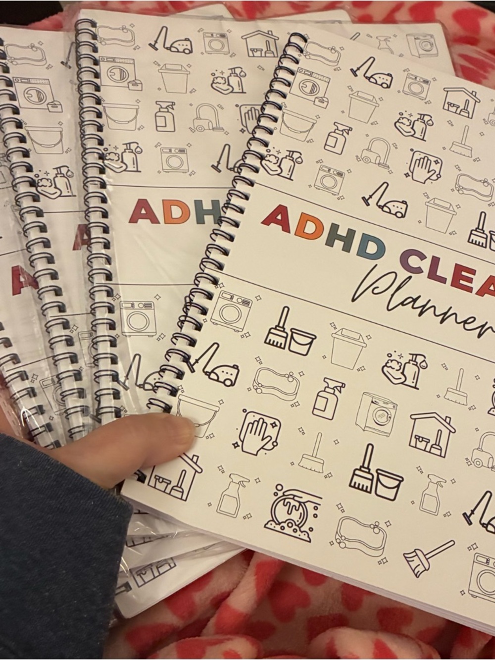 New bundle of four ADHD cleaning planners includes lists, charts, cleaning hacks